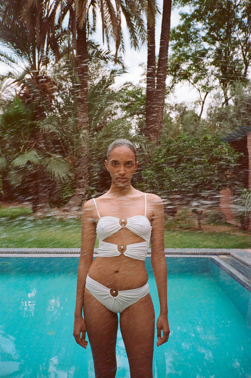 Emmanuelle Lacou wears Pre Fall Swim, photographed by Diana Bartlett.